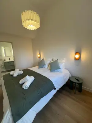 Un ou plusieurs lits dans un hébergement de l'établissement Appartement le Vintage, à deux pas du Port