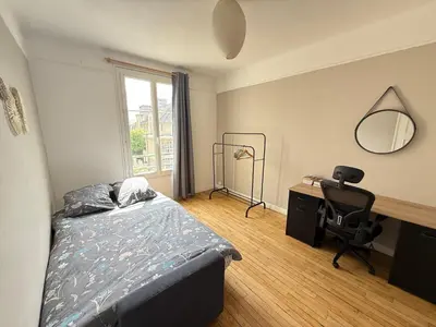 Un ou plusieurs lits dans un hébergement de l'établissement Chez Rami - Charmant T3 - Rue Jacoby