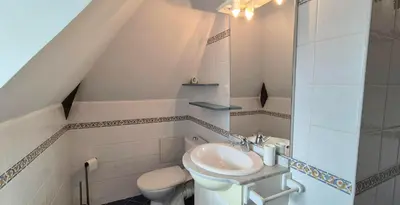 Salle de bains dans l'établissement Domaine de la Ferme de Tumbrel