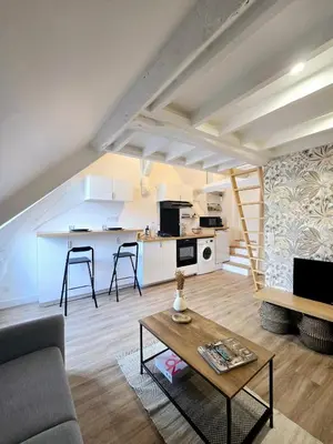 Cuisine ou kitchenette dans l'établissement Le Petit Pontoise