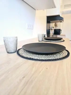 Cuisine ou kitchenette dans l'établissement Le Petit Pontoise