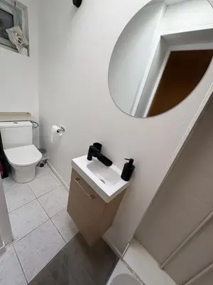 Salle de bains dans l'établissement Les Allées du Parc