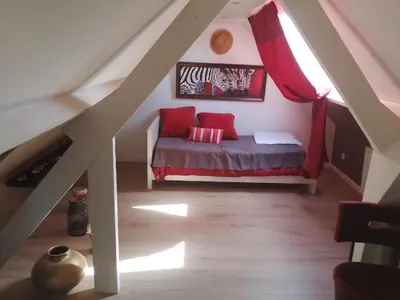 Un ou plusieurs lits dans un hébergement de l'établissement Maison Bord de Seine