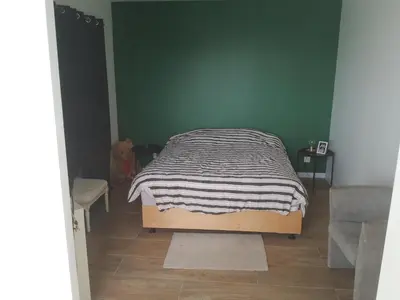 Un ou plusieurs lits dans un hébergement de l'établissement Maison Bord de Seine