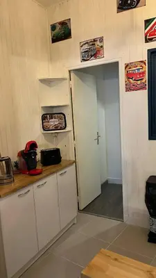 Cuisine ou kitchenette dans l'établissement Joli F1 plein centre de la ville royale d EU