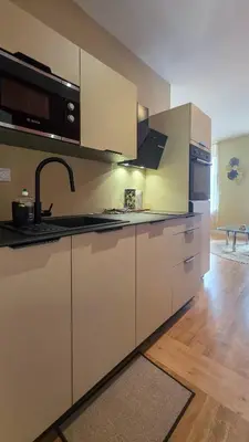 Cuisine ou kitchenette dans l'établissement Le Terracotta