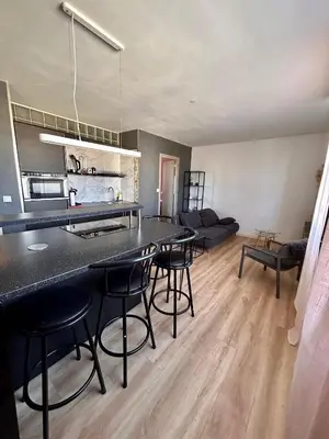Cuisine ou kitchenette dans l'établissement T2 cosy avec parking