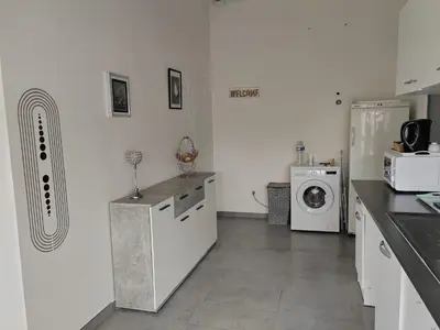 Cuisine ou kitchenette dans l'établissement studio près de cergy calme