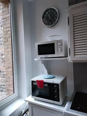 Cuisine ou kitchenette dans l'établissement Joli studio entre port et plage