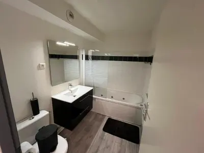 Salle de bains dans l'établissement La Perle