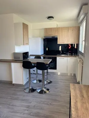 Cuisine ou kitchenette dans l'établissement La Perle