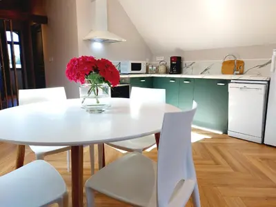 Cuisine ou kitchenette dans l'établissement Gîte Les Jacquemarts Normands