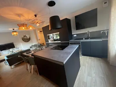 Cuisine ou kitchenette dans l'établissement Home Design