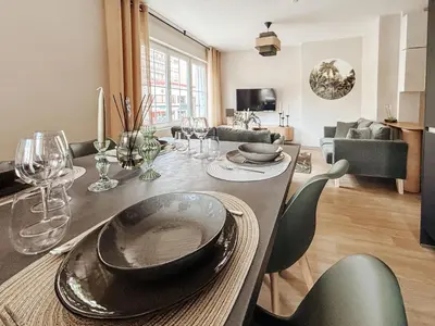 Télévision ou salle de divertissement dans l'établissement Home Design
