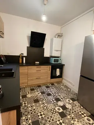 Cuisine ou kitchenette dans l'établissement Spacieux & Lumineux - centre Amiens avec Parking