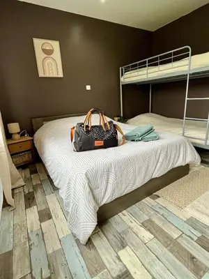 Un ou plusieurs lits dans un hébergement de l'établissement La Pause Bain & Nature