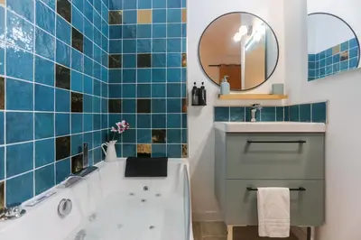 Salle de bains dans l'établissement Appart Ciné Spa Amiens Cathédrale Parking Beffroi
