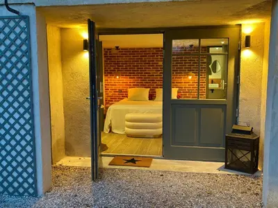 Coin salon dans l'établissement La Folie Giverny - Villa Premium - 3 Suites VIP - 8 Pièces 150M2- Centre Village - Maison privatisée -Jardin paysagé - Parking-