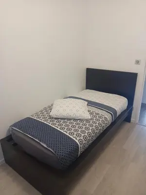 Un ou plusieurs lits dans un hébergement de l'établissement Maison complètement rénovée 3 chambres