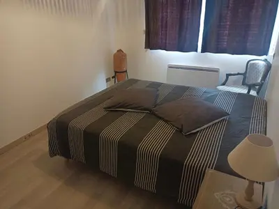 Un ou plusieurs lits dans un hébergement de l'établissement Maison complètement rénovée 3 chambres