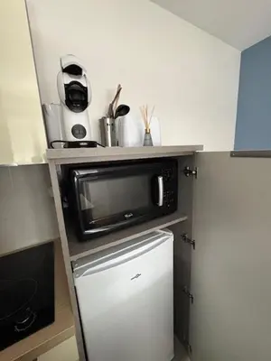 Cuisine ou kitchenette dans l'établissement Le Santorini - Proche cathédrale