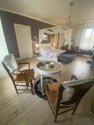 Coin salon dans l'établissement Chez Cathy