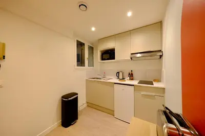 Cuisine ou kitchenette dans l'établissement Rouen centre - Bienvenue chez Coline