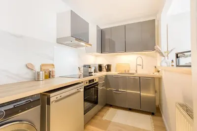 Cuisine ou kitchenette dans l'établissement TYKO HOME Sérénité & Confort proche Paris