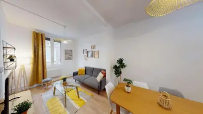 Coin salon dans l'établissement Maison cosy et calme à proximité de la gare