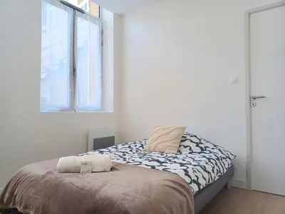 Un ou plusieurs lits dans un hébergement de l'établissement Le Clos Carnot 2 - Proche Commodités