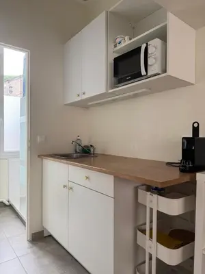 Cuisine ou kitchenette dans l'établissement Charmant Studio à 2 pas de la gare et du centre