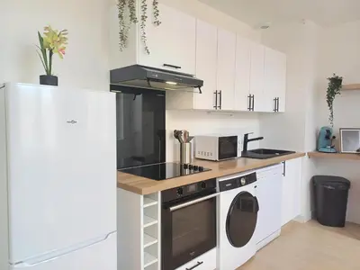 Cuisine ou kitchenette dans l'établissement Le Clos Carnot 5 - Proche Commodités