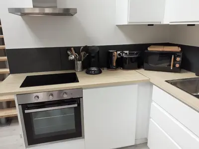 Cuisine ou kitchenette dans l'établissement Manoir de l'As de Trèfle