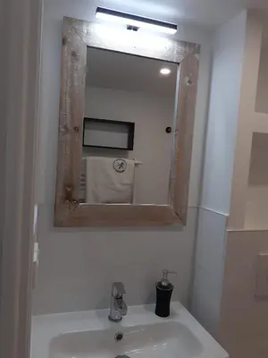 Salle de bains dans l'établissement Manoir de l'As de Trèfle
