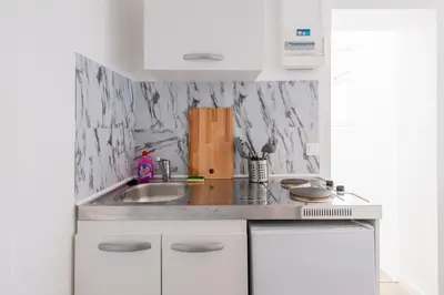 Cuisine ou kitchenette dans l'établissement Studio tout équipé proche centre ville & gare