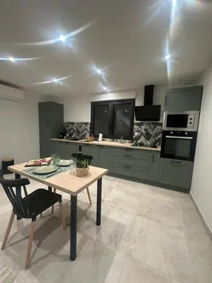 Cuisine ou kitchenette dans l'établissement L'évasion