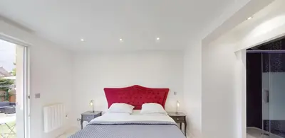 Un ou plusieurs lits dans un hébergement de l'établissement Kimia Suite Room