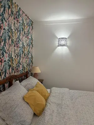 Un ou plusieurs lits dans un hébergement de l'établissement Appartements des Compagnons