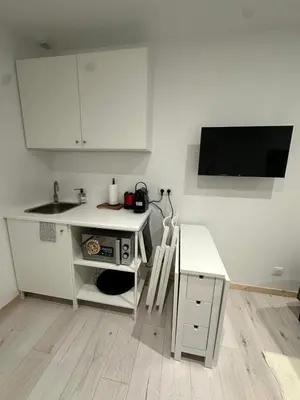 Cuisine ou kitchenette dans l'établissement Le carré long