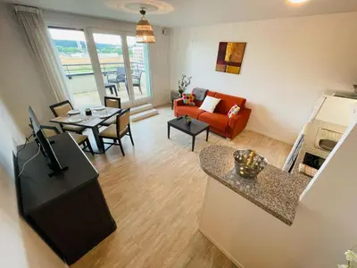 Coin salon dans l'établissement Terrasse & Confort à Rouen - 396