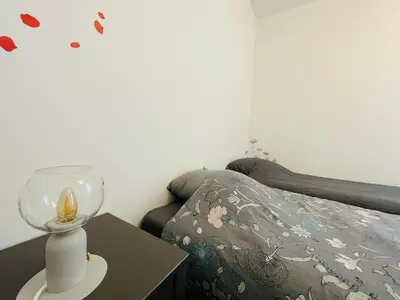 Un ou plusieurs lits dans un hébergement de l'établissement Terrasse & Confort à Rouen - 396