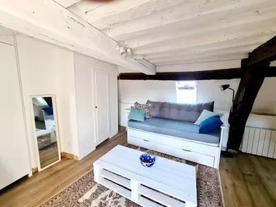 Un ou plusieurs lits dans un hébergement de l'établissement Appartement cosy & mezzanines