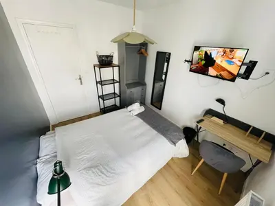 Un ou plusieurs lits dans un hébergement de l'établissement L'appartement du bonheur - 398