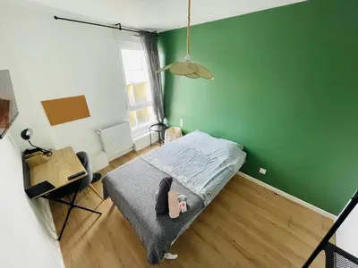 Un ou plusieurs lits dans un hébergement de l'établissement L'appartement du bonheur - 398