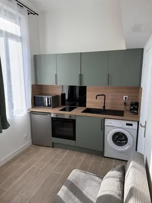 Cuisine ou kitchenette dans l'établissement Studio Cosy - Centre Ville