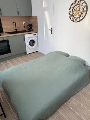 Cuisine ou kitchenette dans l'établissement Studio Cosy - Centre Ville