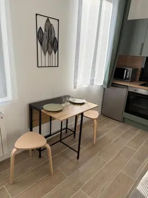 Cuisine ou kitchenette dans l'établissement Studio Cosy - Centre Ville