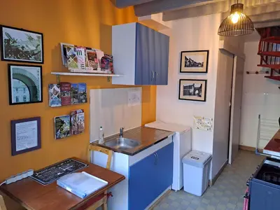 Cuisine ou kitchenette dans l'établissement Chez Robins