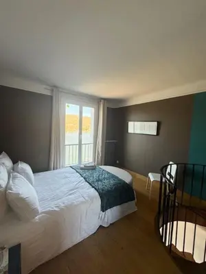 Un ou plusieurs lits dans un hébergement de l'établissement Duplex - vue sur la Seine au centre ville de Vernon