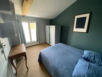 Un ou plusieurs lits dans un hébergement de l'établissement Superbe appartement calme et indépendant